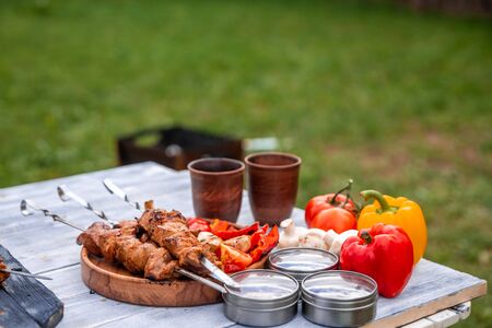 meat bell pepper mushrooms lie on the table in natureの写真素材