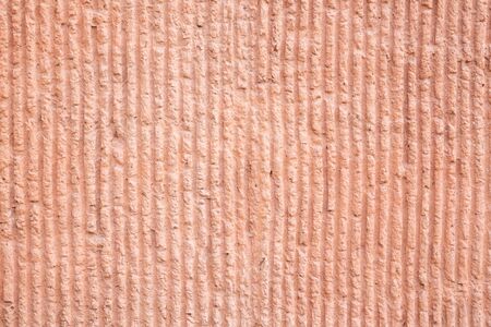 red stone wall vertical laying