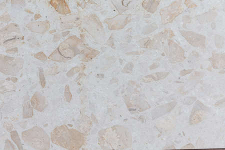 Gray cement wall with orange spots