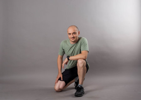 young bald man studio shotの写真素材