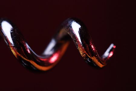 Close-up of chrome corkscrewの写真素材