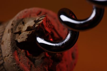 Corkscrew in the cork under red light