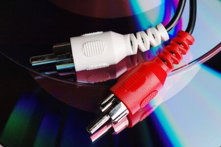 RCA plugs over dvd diskの写真素材