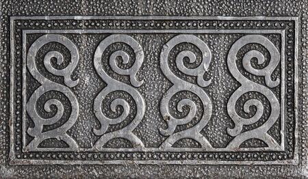 Ornament on the old metal box. Texture.の写真素材