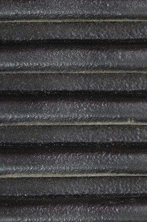 Crimped plastic. Texture. Old and dusty.