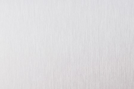Plate made from brushed aluminum. Texture. Vertical lines.