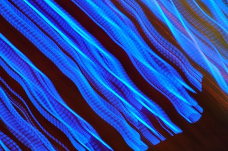 Moition blurred lighting abstract. Black and blue color.