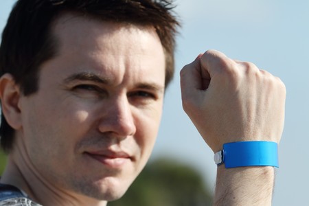 Man with vip tag on the wrist. Focus on the hand.の写真素材