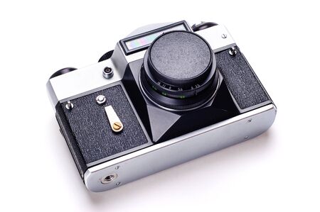 35mm film photo camera on the white background.