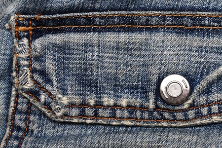 Aged blue jeans close-up. Texture.の写真素材