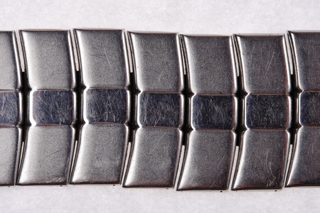 Old and scratched metal wristwatch bracelet  Fragment 