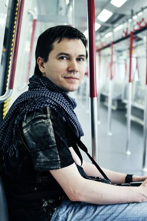 Man sitting in the empty metro train  Hong Kong  China の写真素材