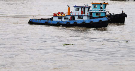 Tugbot in the Chao Phraya river  Bangkok  Thailand の写真素材