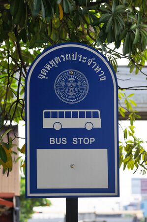 BANGKOK - SEPTEMBER 3: The bus stop sign with thai letters.. Bangkok, Thailand - September 3, 2011.のeditorial素材