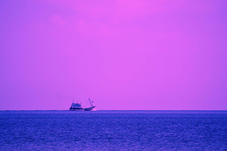 Small ship on the horizon.の写真素材