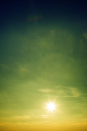 Bright sun shines in the sky.の写真素材