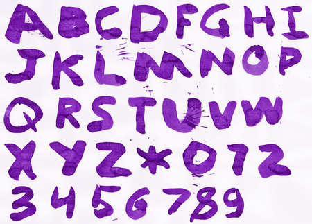 Alphabet painted with indian ink on paper.の写真素材