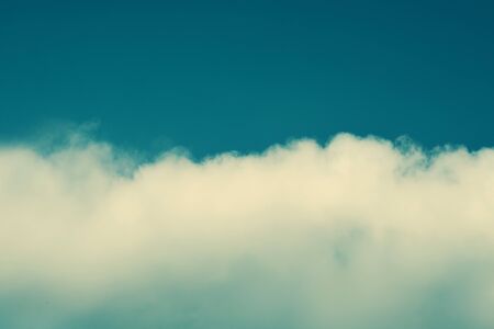 Big fluffy clouds in blue sky.の写真素材