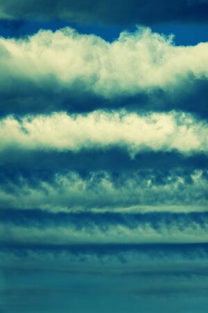 Striped clouds in the morning sky.