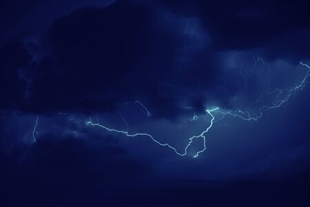 Awesome thunderbolt in dark night sky.