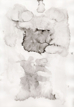 Abstract ink blots on paper.の写真素材