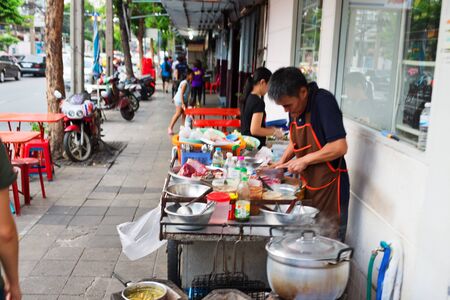 BANGKOK, THAILAND - SEPTEMBER 9, 2015: Noisy and colorful life-filled streets of Bangkok.のeditorial素材