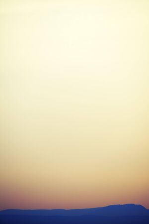 Beautiful hiils under foggy skies. Nature background.の写真素材