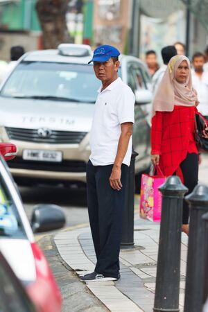 KUALA LUMPUR, MALAYSIA - AUGUST 19, 2016: Noisy and colorful life-filled streets of Kuala Lumpur.のeditorial素材