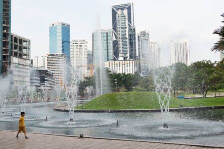 KUALA LUMPUR, MALAYSIA - AUGUST 18, 2016: Noisy and colorful life-filled streets of Kuala Lumpur.のeditorial素材