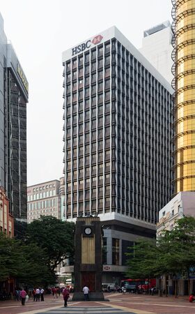 KUALA LUMPUR, MALAYSIA - AUGUST 19, 2016: Noisy and colorful life-filled streets of Kuala Lumpur.