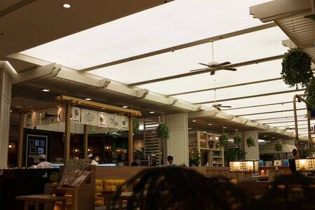 BANGKOK, THAILAND - SEPTEMBER 4, 2016: Tourists and locals walks inside big shopping mall.