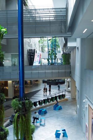BANGKOK, THAILAND - SEPTEMBER 4, 2016: Tourists and locals walks inside big shopping mall.