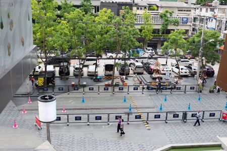 BANGKOK, THAILAND - SEPTEMBER 4, 2016: Tourists and locals on the noisy and colorful life-filled...