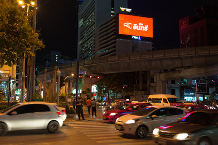 BANGKOK, THAILAND - SEPTEMBER 4, 2015: Beautiful view of the crowded Bangkok's streets at night time.のeditorial素材