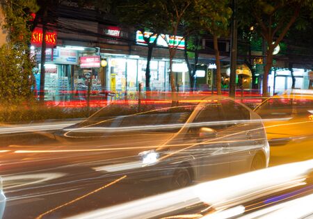 BANGKOK, THAILAND - AUGUST 29, 2015: Night traffic on the streets of Bangkok. Long exposure photography.のeditorial素材