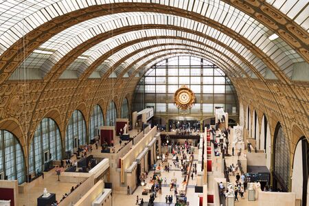 PARIS, FRANCE - MAY 7, 2016: Exposition of museum d'Orsay crowded with the tourists.のeditorial素材