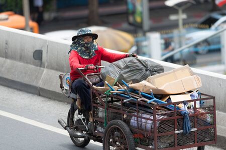 BANGKOK, THAILAND - AUGUST 24, 2016: Road traffic on the street in downtown of Bangkok.のeditorial素材