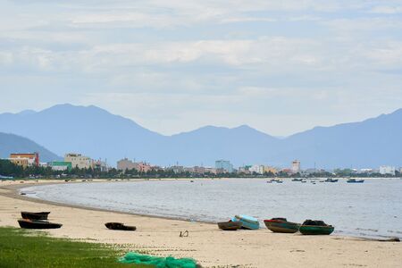 DA NANG, VIETNAM - AUGUST 1, 2017: Coracle fishing boats on the beautiful public beach located in Da Nang city.のeditorial素材