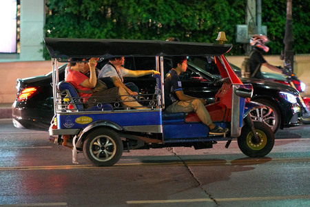 BANGKOK, THAILAND - July 21, 2017: Road traffic in Bangkok downtown. Noisy and colorful vehicles on...