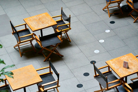 Tables and chairs to set style.の写真素材