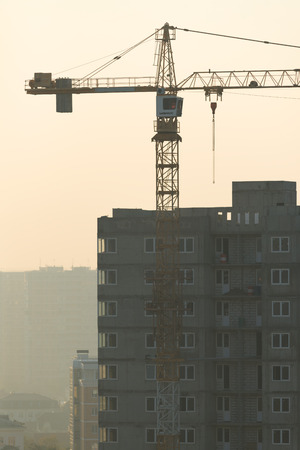 KRASNODAR, RUSSIA - OCTOBER 29, 2016: Tower cranes work on the construction sites in the city.のeditorial素材