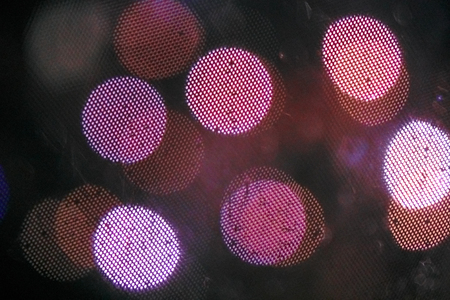 Purple bokeh circles. Out of focus background.の写真素材