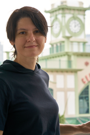 HONG KONG - September 5, 2017: Female european tourist is posing on the street of big city in time of happy vacation trip.のeditorial素材
