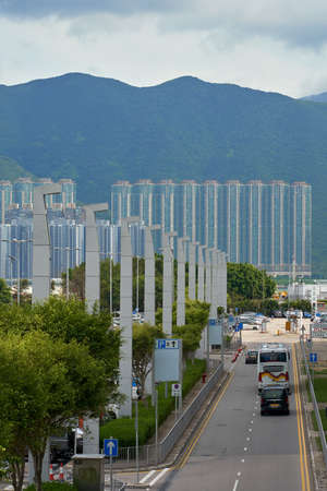 HONG KONG - SEPTEMBER 6, 2017: Condominiums near HK Airport (HKG) - Chek Lap Kok.のeditorial素材