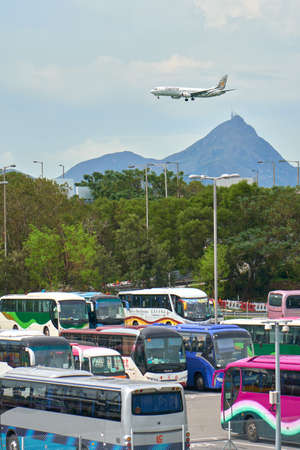 HONG KONG - SEPTEMBER 6, 2017: Myanmar Airlines plane is landing in HK Airport (HKG) - Chek Lap Kok.のeditorial素材