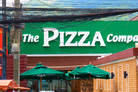 PHUKET, THAILAND - JULY 7, 2018: The Pizza Company sign on the street of Patong district, Phuket, Thailand.のeditorial素材