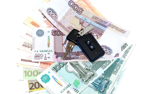 Car keys and russian money isolated on white backgroundの写真素材