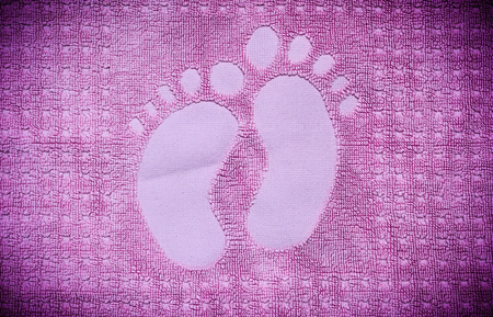 Towel with the foot prints.の写真素材