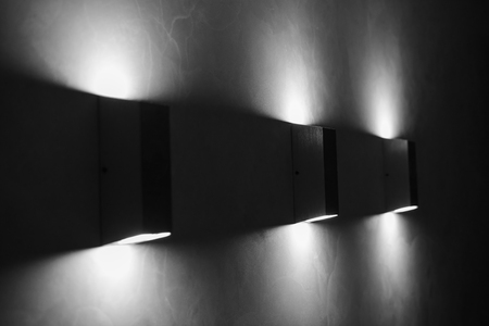 Modern wall lamps on wall. dark styleの写真素材