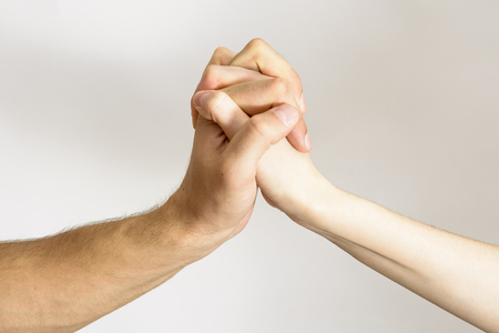 Handshake men and women on white backgroundの写真素材
